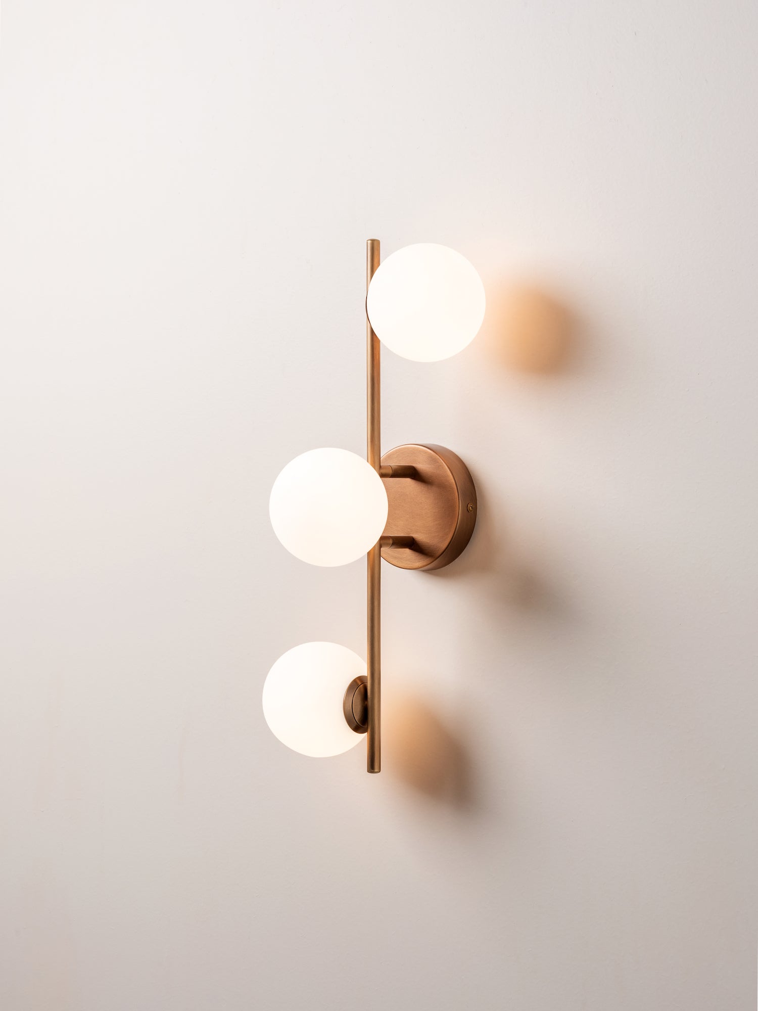 Coro - 3 light aged brass and opal ceiling / wall