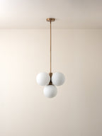 Boule - 4 light brass and opal pendant light