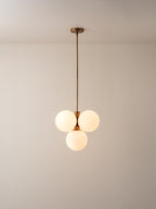 Boule - 4 light brass and opal pendant light