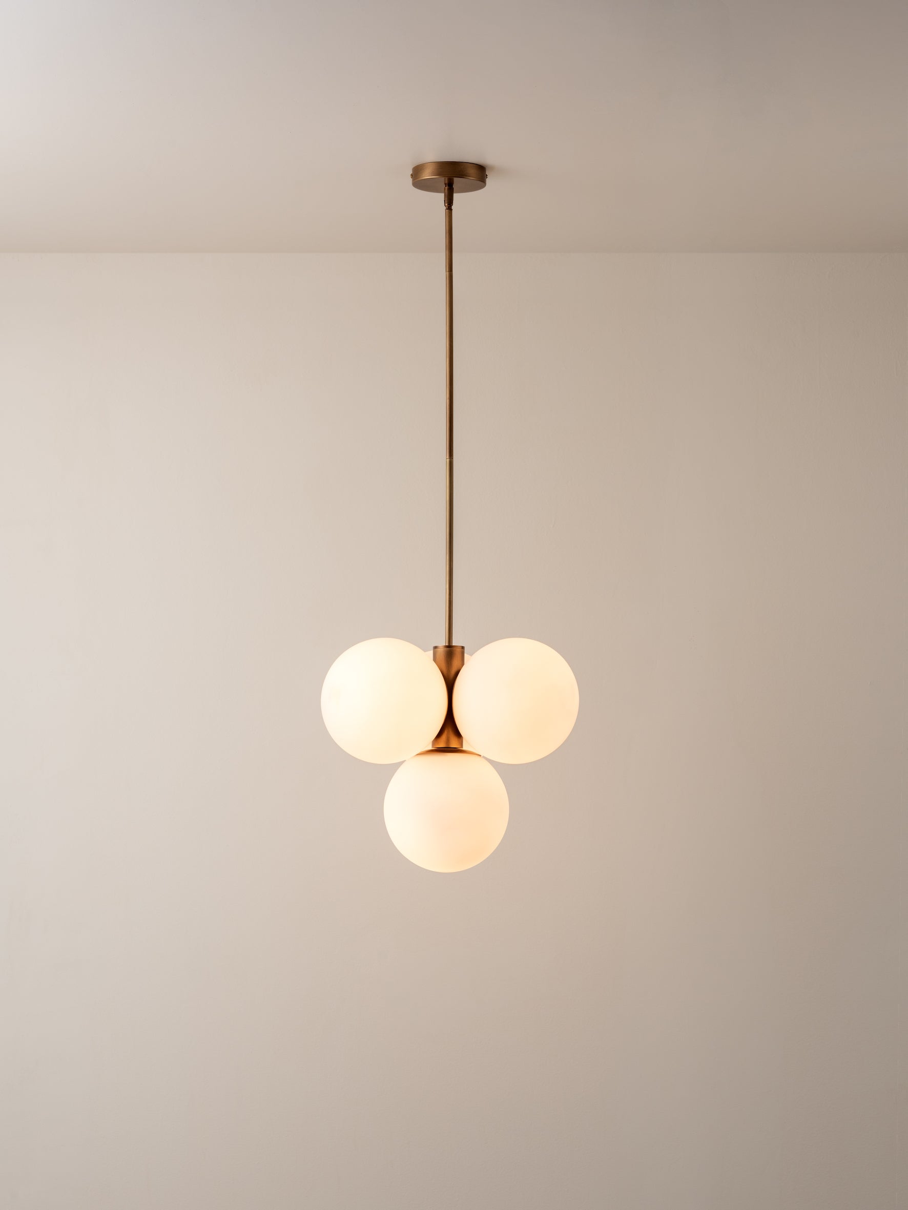Boule - 4 light brass and opal pendant light