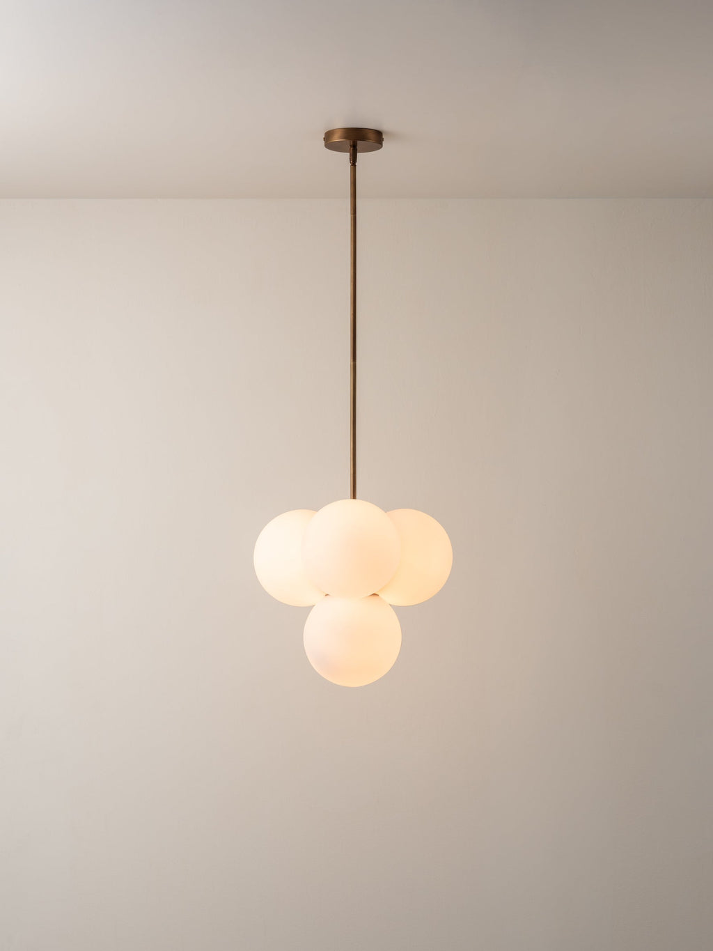 Boule - 4 light brass and opal pendant light
