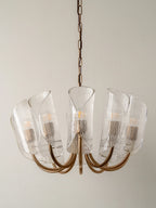 Cannoli - 10 light aged brass and textured glass chandelier