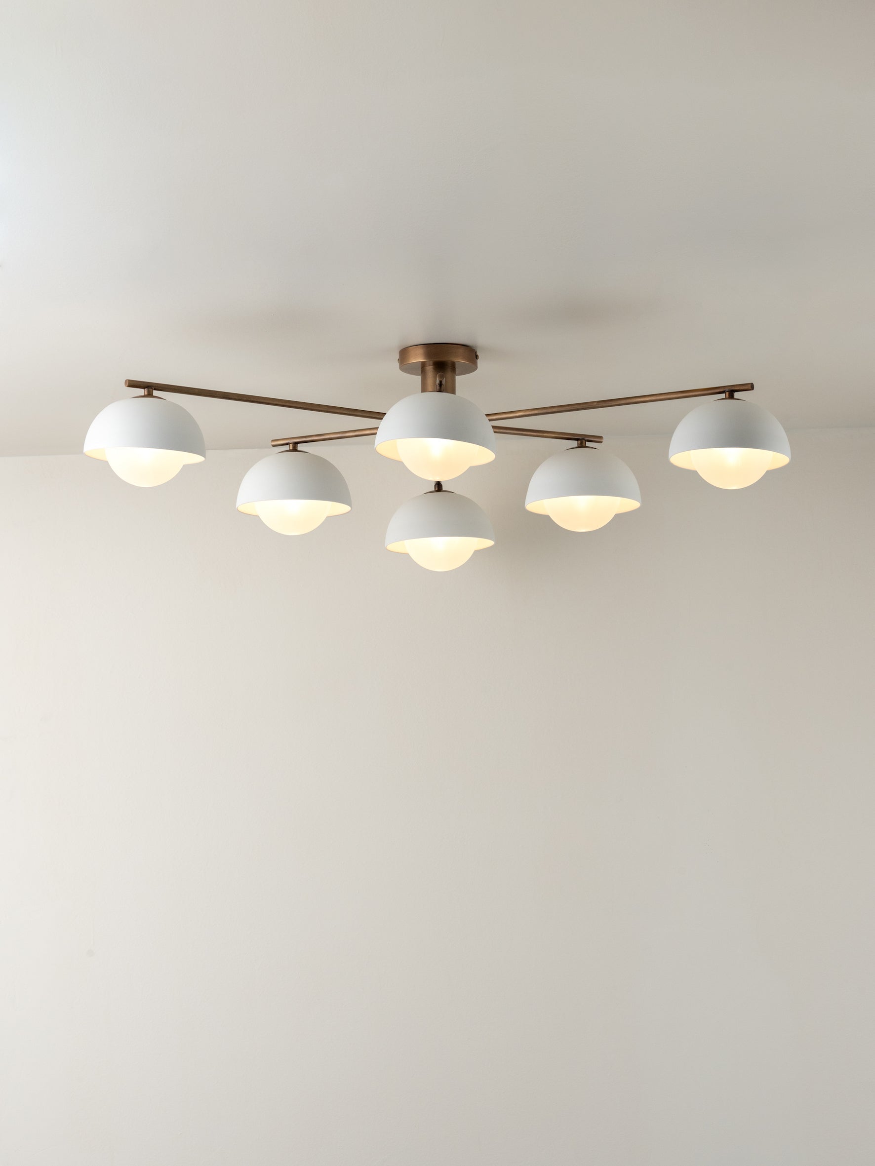 Porsa - 6 light aged brass and warm white porcelain flush