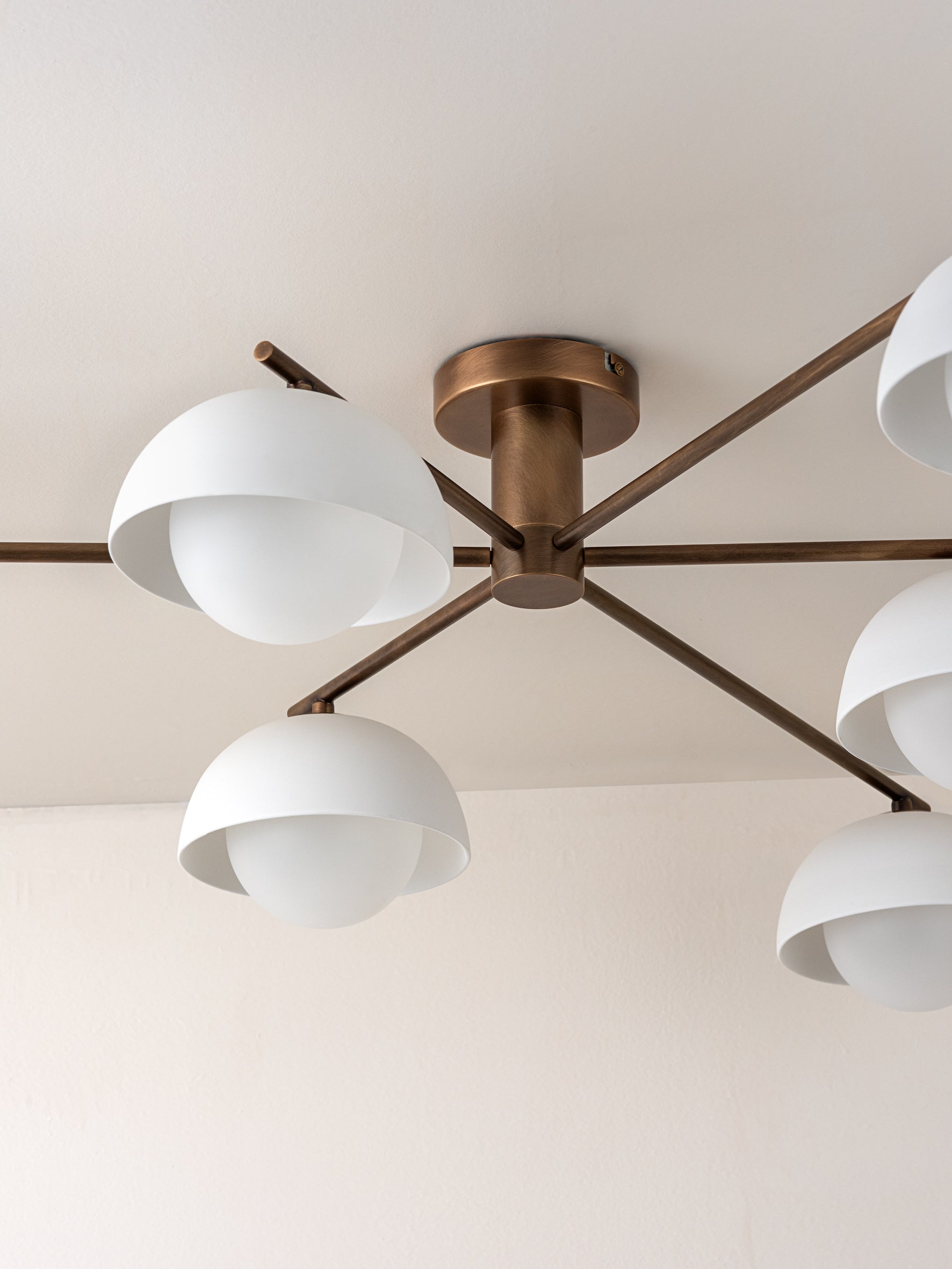 Porsa - 6 light aged brass and warm white porcelain flush